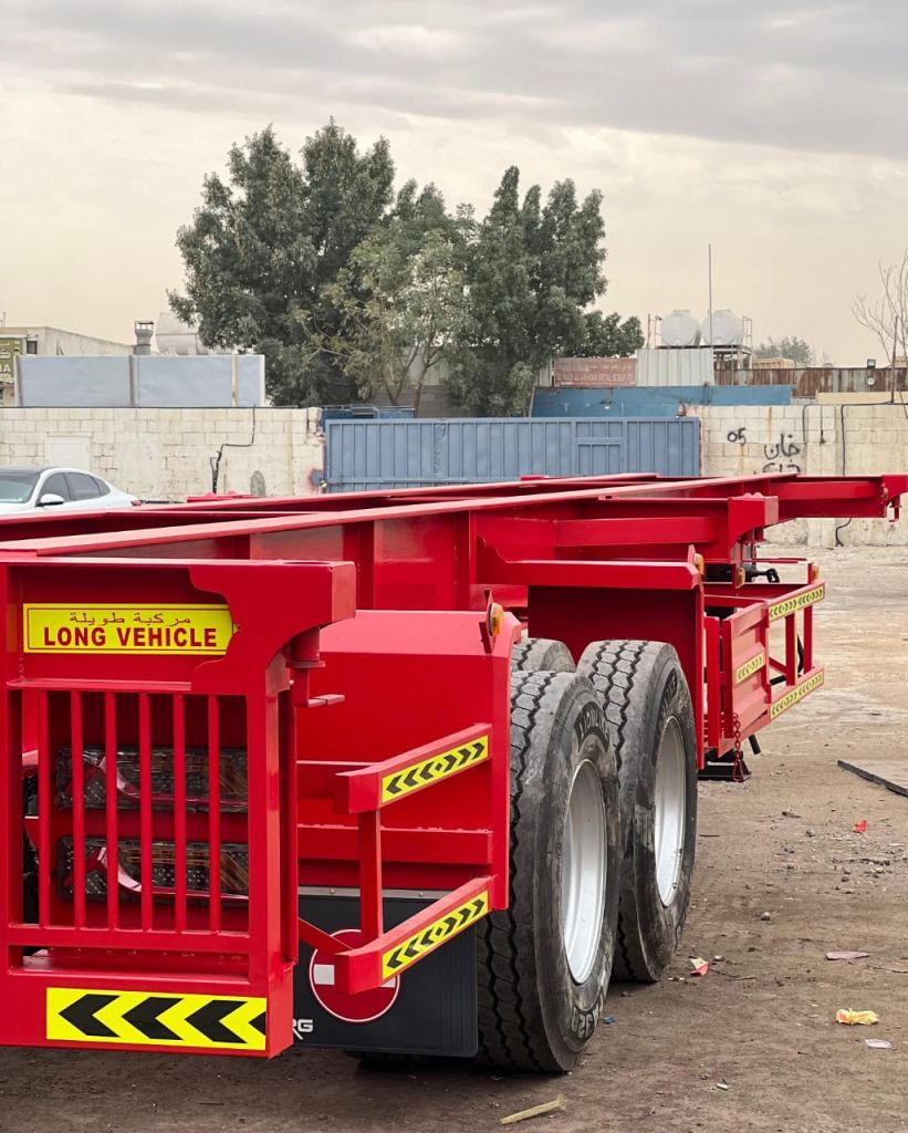 Lowbed trailers Dubai used for transporting heavy machinery and oversized cargo.